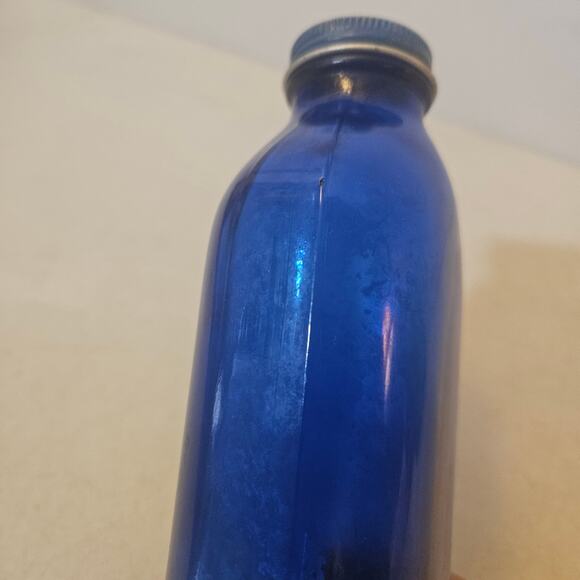 Old vintage cobalt blue glass bottle with metal cap - Picture 3 of 6